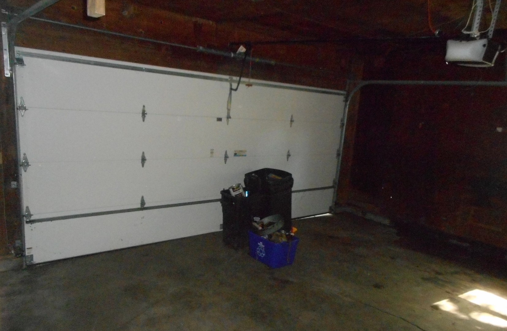 186 Alfred Drive Sycamore, IL 60178 - Photo 14 of 15 a room with water heater and wooden cabinets