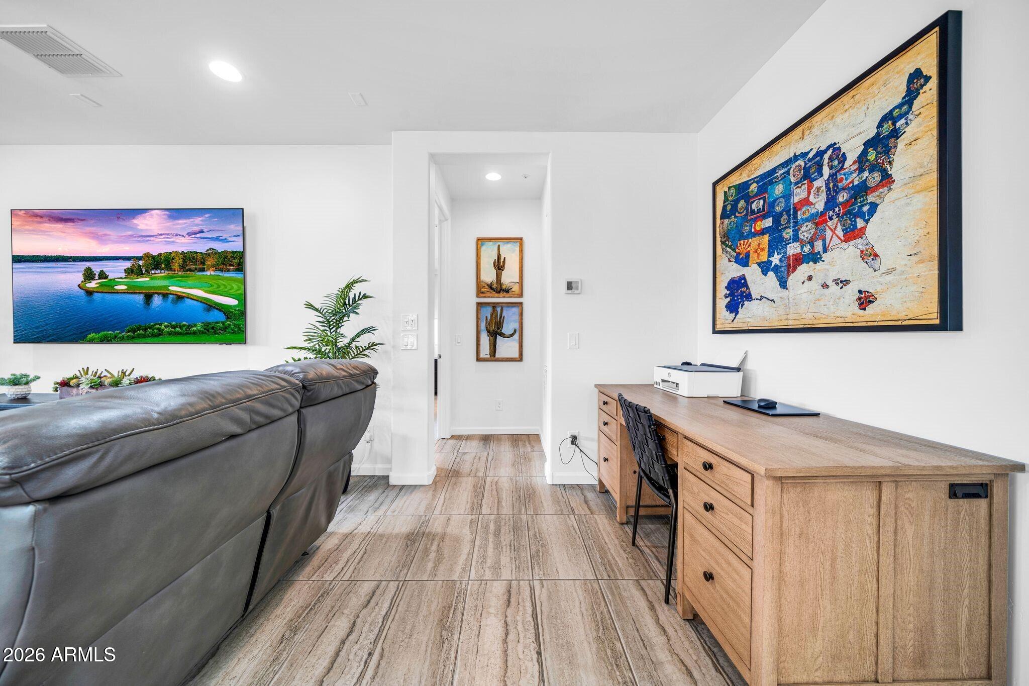 17983 East Vista Desierto Rio Verde, AZ 85263 - Photo 16 of 30 a living room with furniture and a flat screen tv