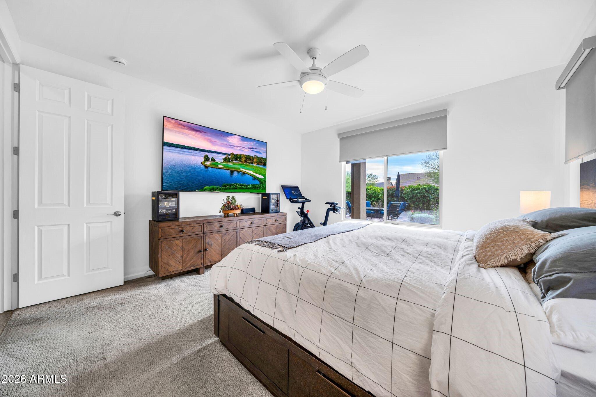 17983 East Vista Desierto Rio Verde, AZ 85263 - Photo 18 of 30 a bedroom with a bed and a large window
