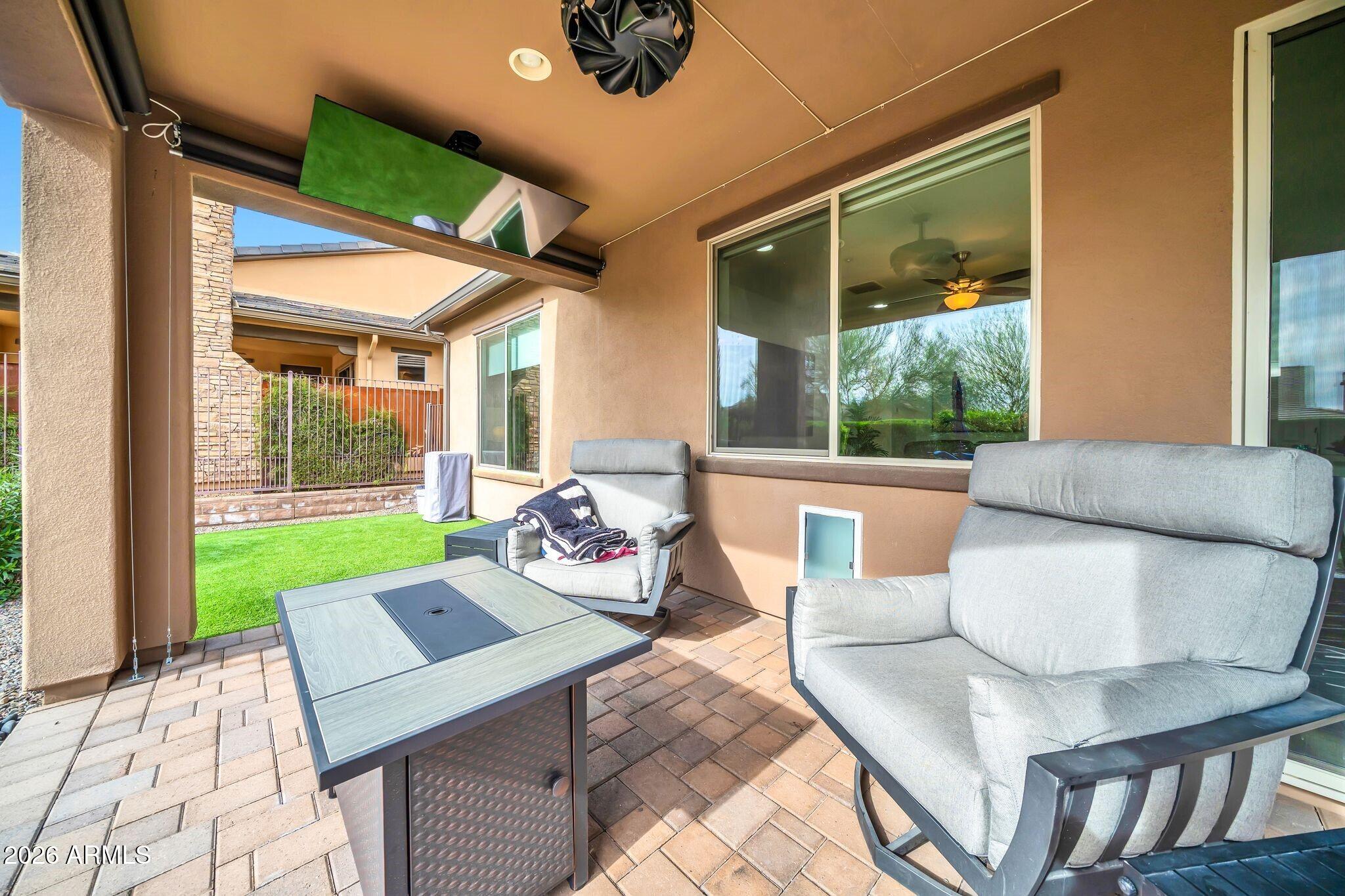 17983 East Vista Desierto Rio Verde, AZ 85263 - Photo 25 of 30 a living room with furniture and a window