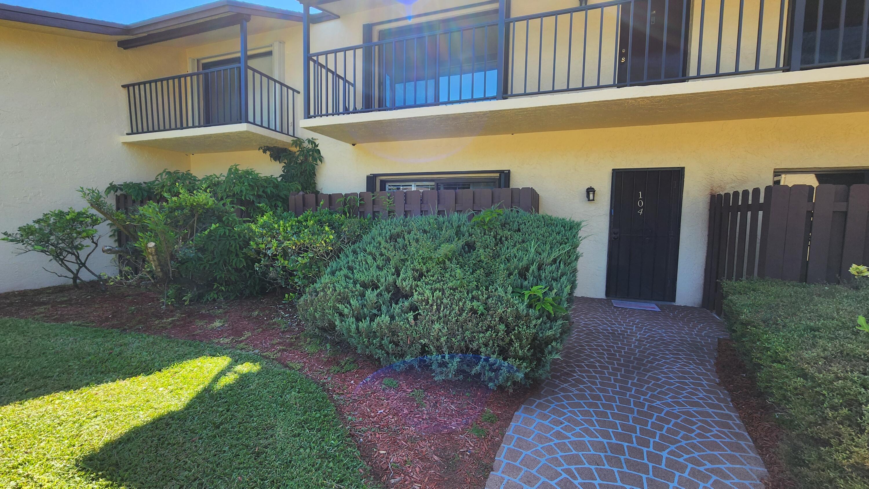 2050 Oleander Boulevard, Unit 9104 Fort Pierce, FL 34950 - Photo 2 of 27 a view of a back yard of the house
