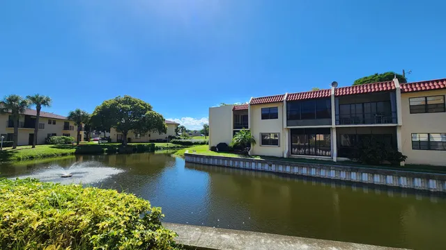 a view of a swimming pool with a lake view