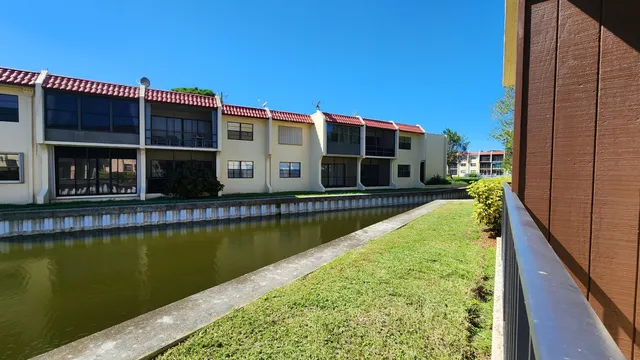a view of swimming pool with outdoor seating
