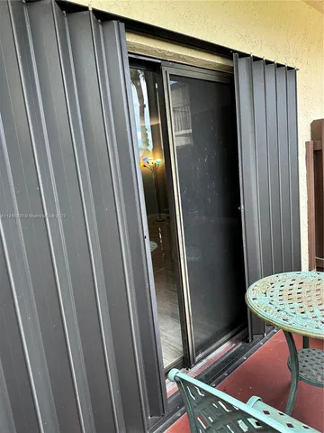 a view of chair in a kitchen