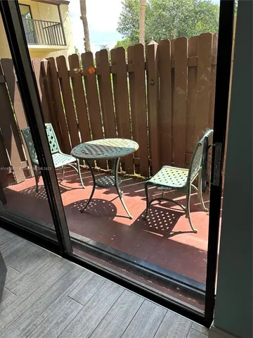 a view of outdoor space with seating area