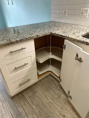 a view of storage and utility room