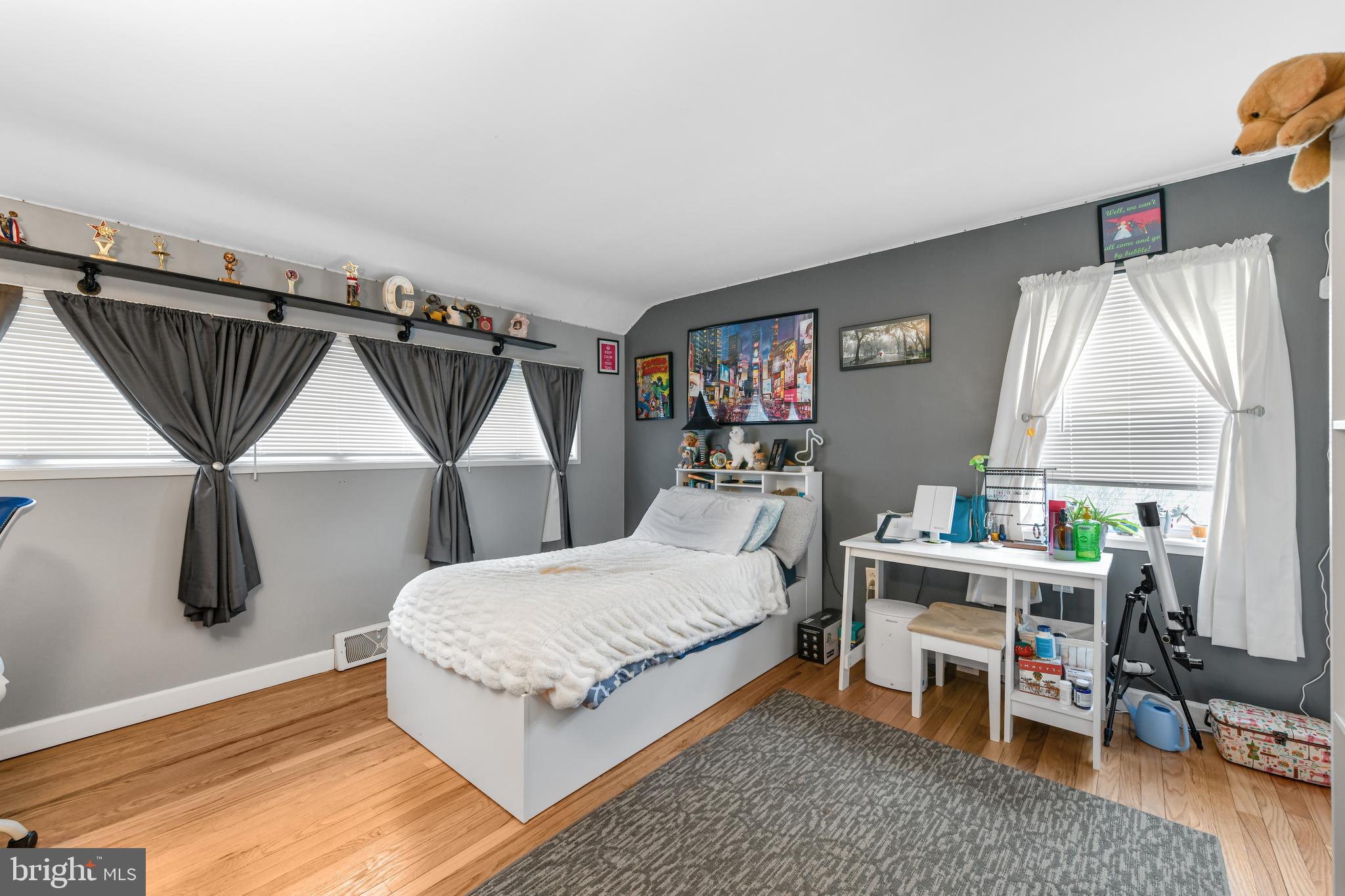 203 Eric Avenue Reading, PA 19607 - Photo 12 of 46 a bedroom with a bed a desk and chair