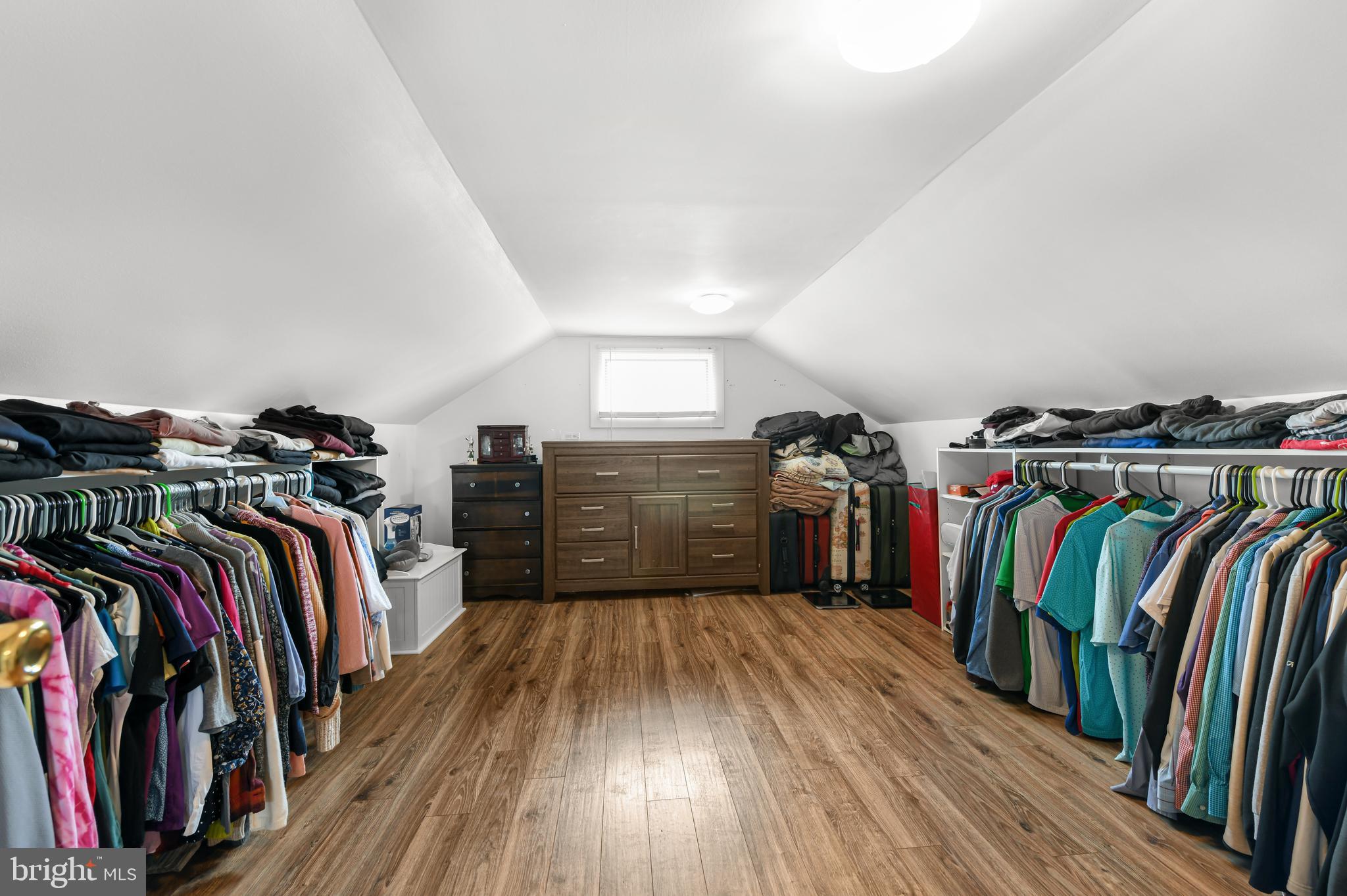 203 Eric Avenue Reading, PA 19607 - Photo 19 of 46 a view of walk in closet with clothes and shoes