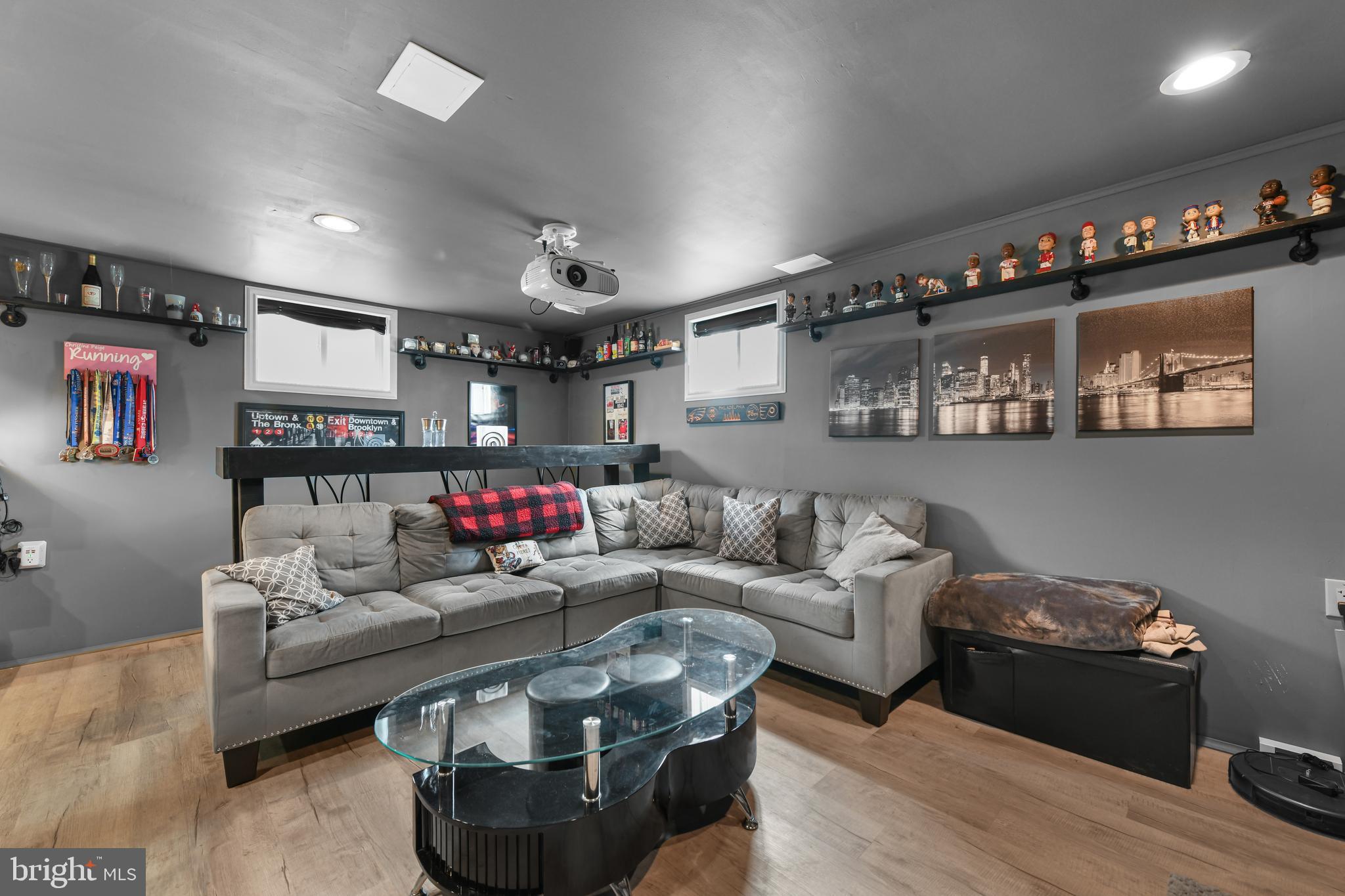 203 Eric Avenue Reading, PA 19607 - Photo 21 of 46 a living room with furniture and a wooden floor