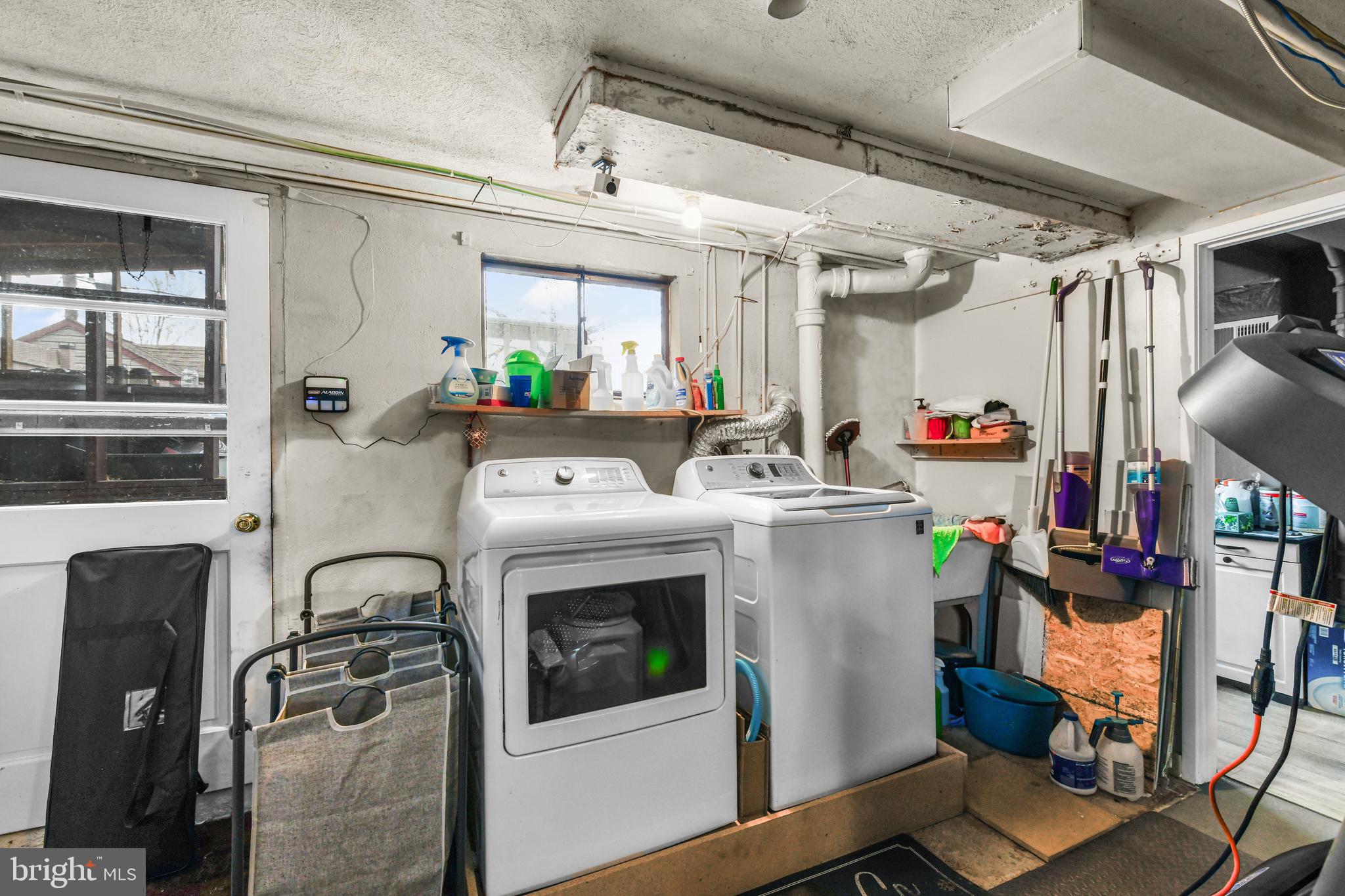 203 Eric Avenue Reading, PA 19607 - Photo 26 of 46 a utility room with dryer and washer