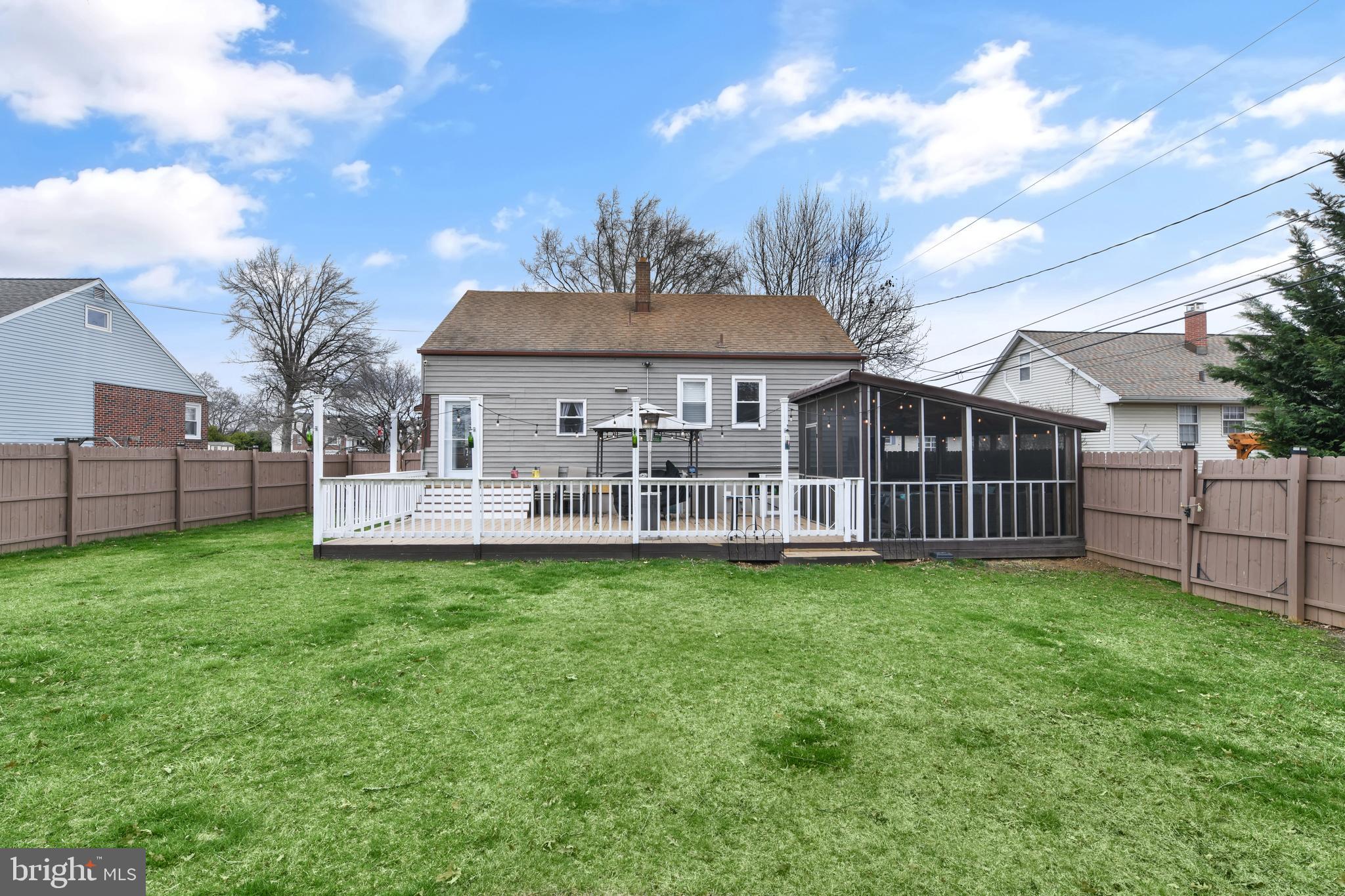 203 Eric Avenue Reading, PA 19607 - Photo 33 of 46 a view of a house with backyard and sitting area