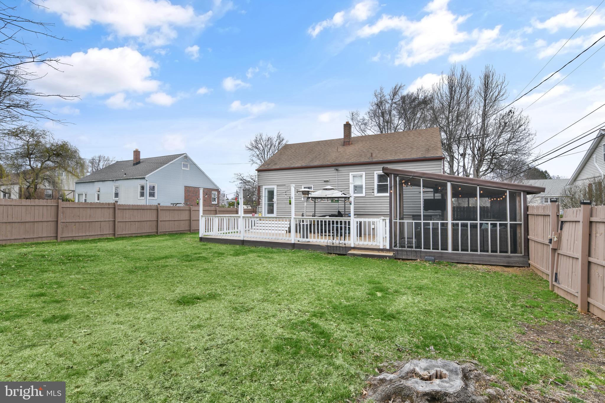203 Eric Avenue Reading, PA 19607 - Photo 35 of 46 a view of a house with backyard and porch
