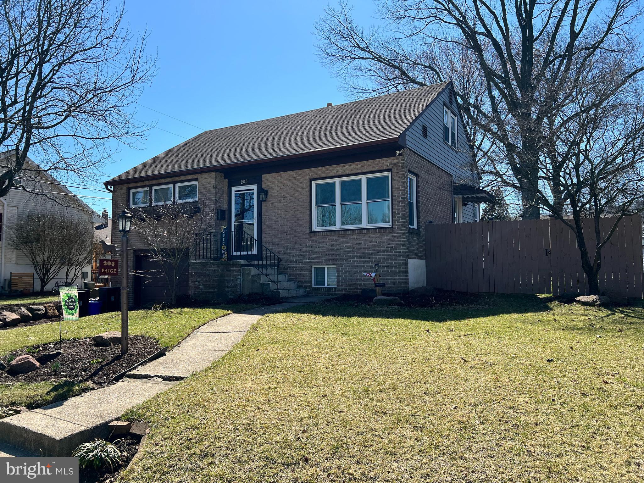 203 Eric Avenue Reading, PA 19607 - Photo 40 of 46 a front view of house with yard and trees