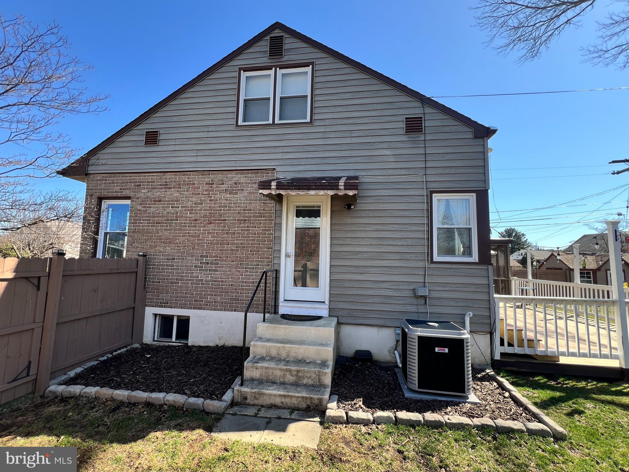 203 Eric Avenue Reading, PA 19607 - Photo 45 of 46 a front view of a house with a yard