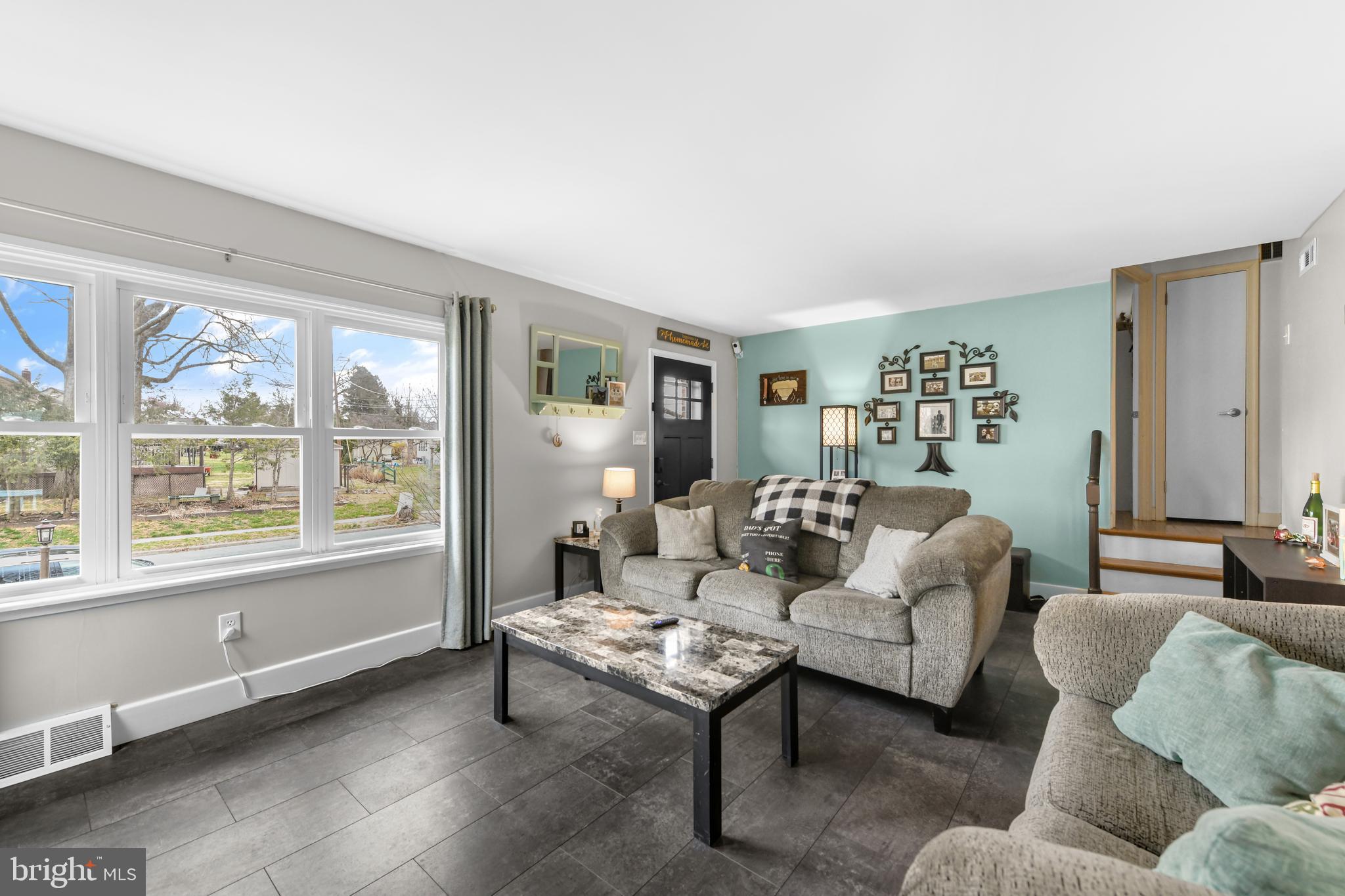 203 Eric Avenue Reading, PA 19607 - Photo 5 of 46 a living room with furniture and a window