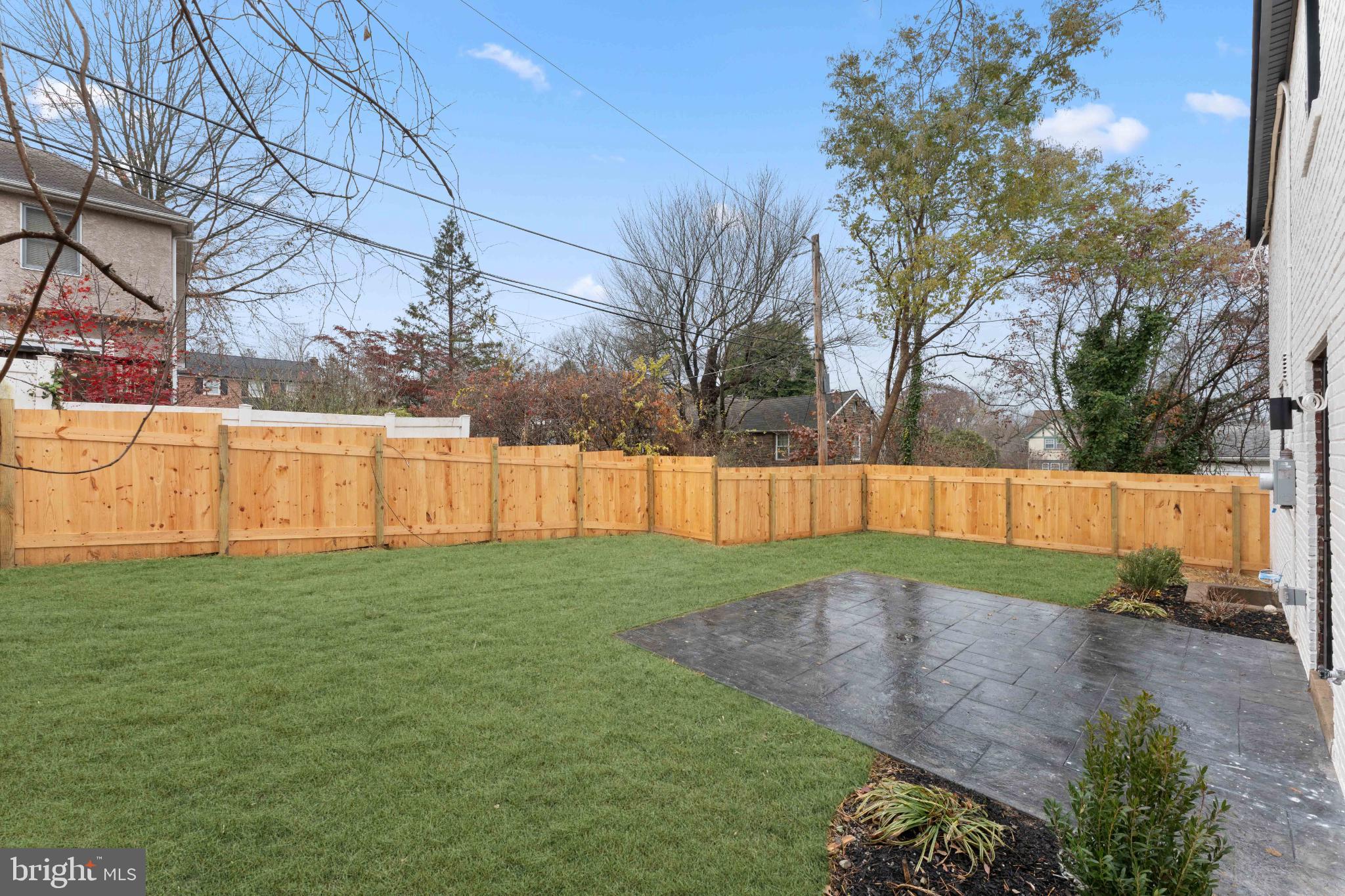 534 Ott Road Bala Cynwyd, PA 19004 - Photo 37 of 40 Serene backyard oasis with wooden fencing.