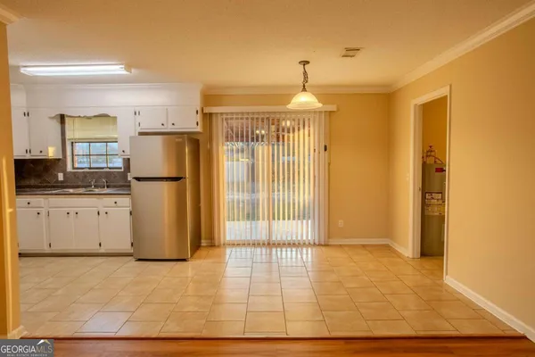 a view of a kitchen with a sink