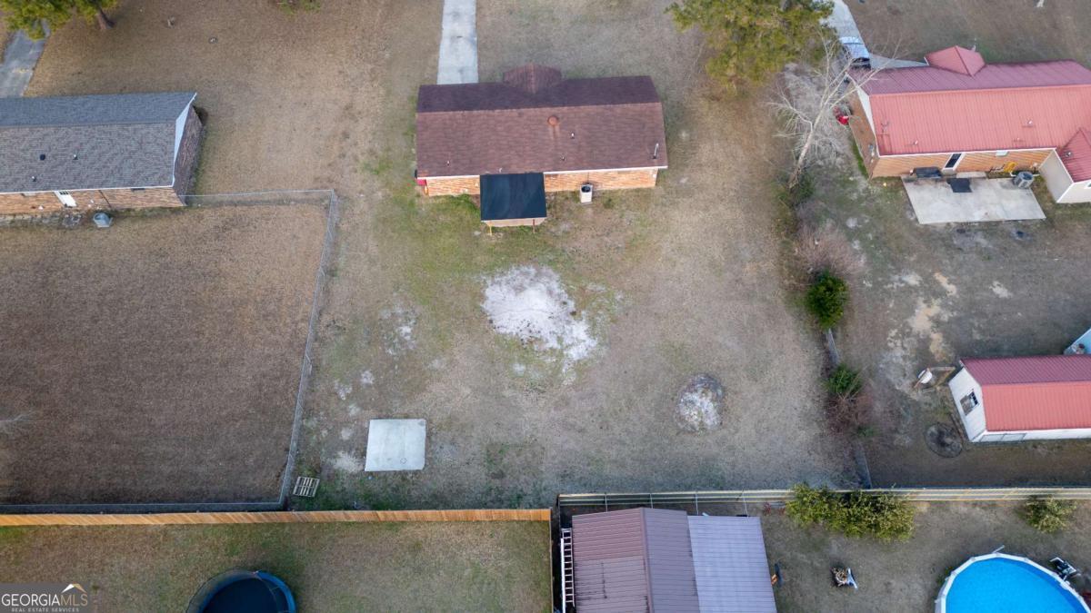 121 Trapper Trail Blackshear, GA 31516 - Photo 21 of 21 an aerial view of a house with a yard