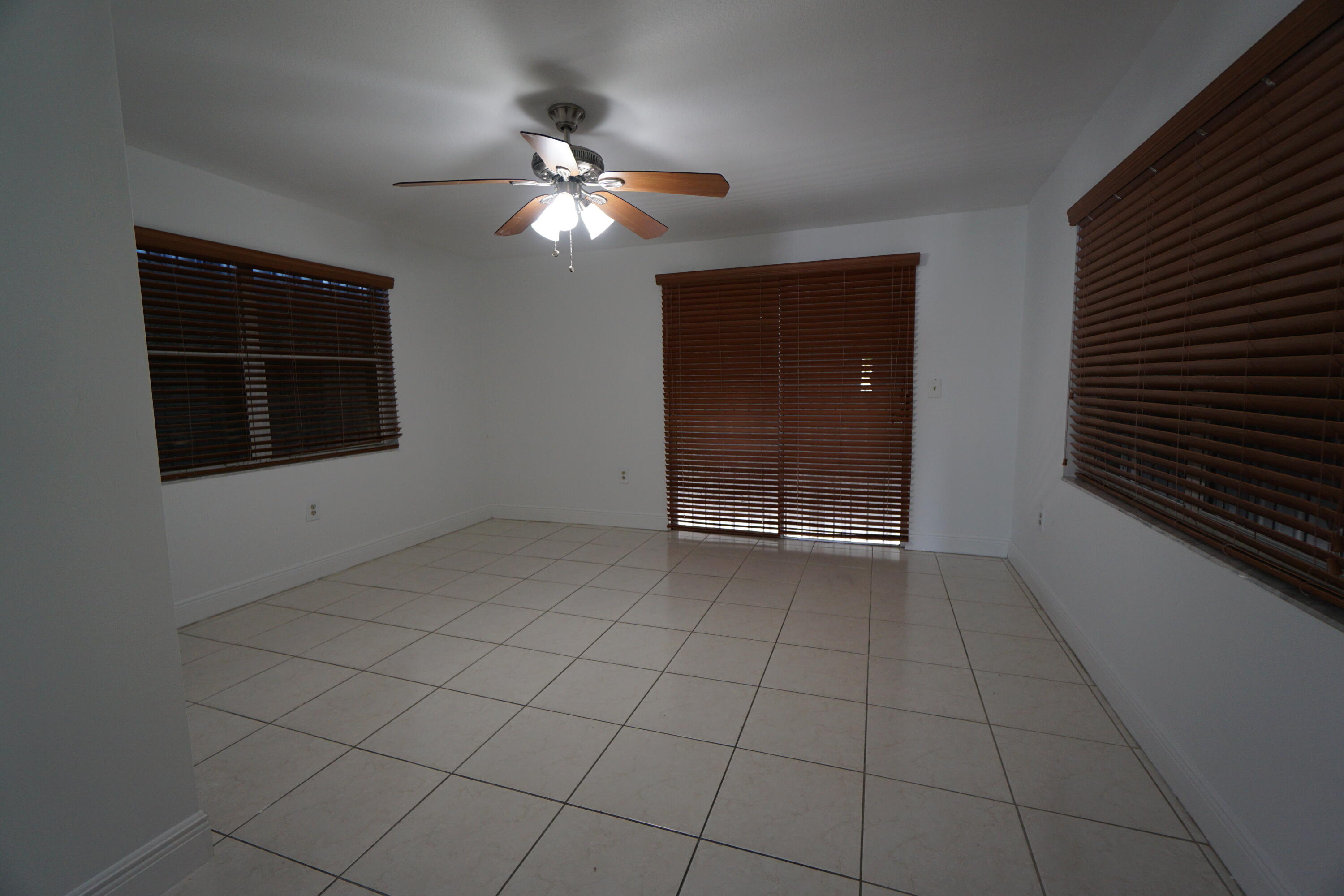 15520 Southwest 302nd Street Homestead, FL 33033 - Photo 19 of 20 a view of an empty room with a window