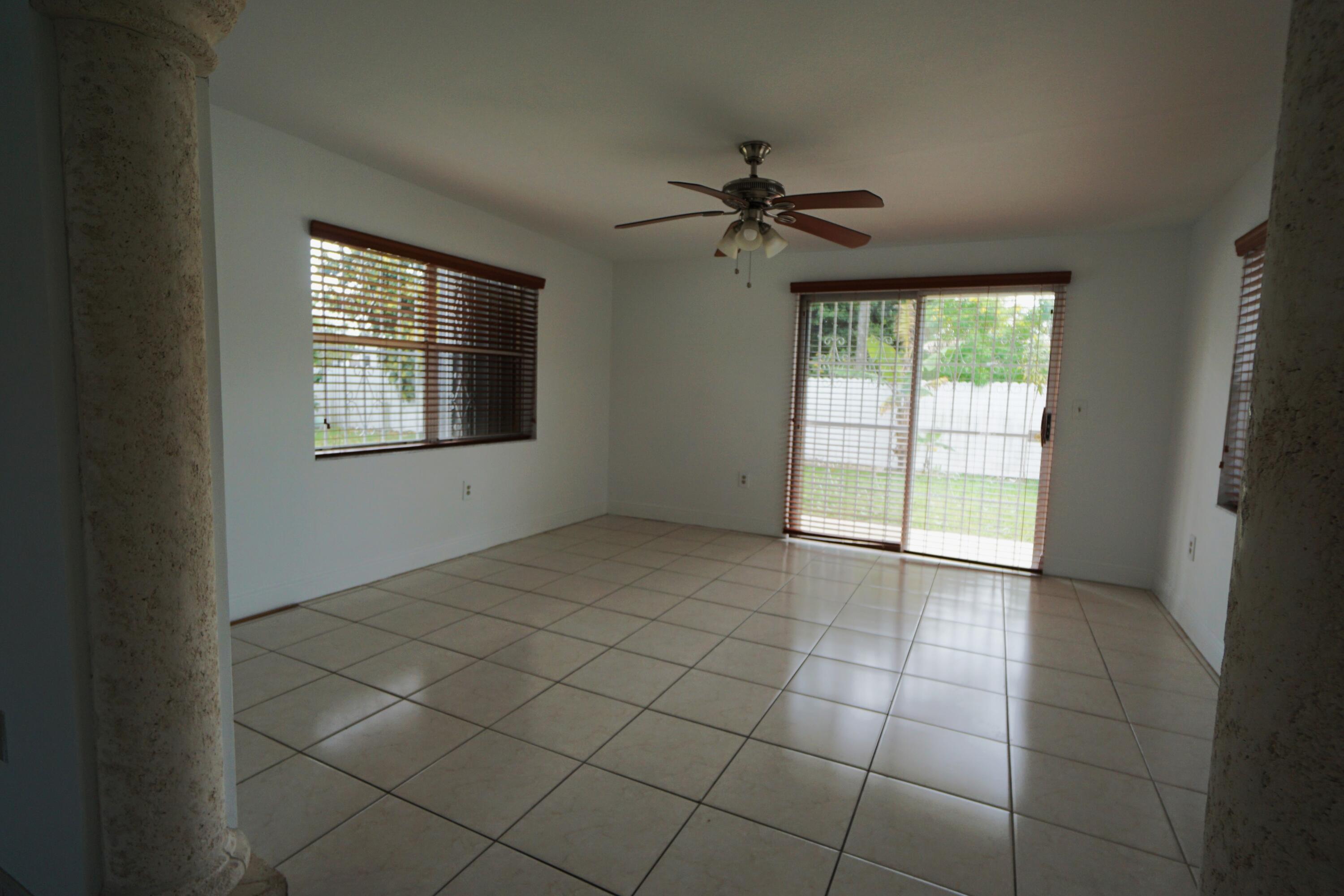 15520 Southwest 302nd Street Homestead, FL 33033 - Photo 4 of 20 a view of an empty room with a window