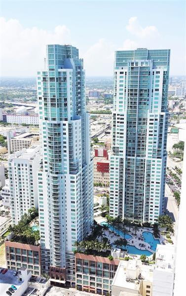 253 Northeast 2nd Street, Unit 421 Miami, FL 33132 - Photo 2 of 39 a view of a city with tall buildings