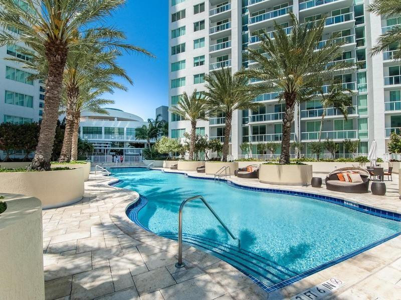 253 Northeast 2nd Street, Unit 421 Miami, FL 33132 - Photo 32 of 39 a view of a house with swimming pool and sitting area