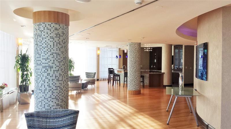 253 Northeast 2nd Street, Unit 421 Miami, FL 33132 - Photo 39 of 39 a lobby with furniture and floor
