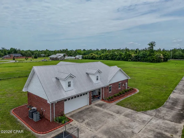 $500,000 | 15189 Northwest Columbus Drive, Altha, FL 32421
