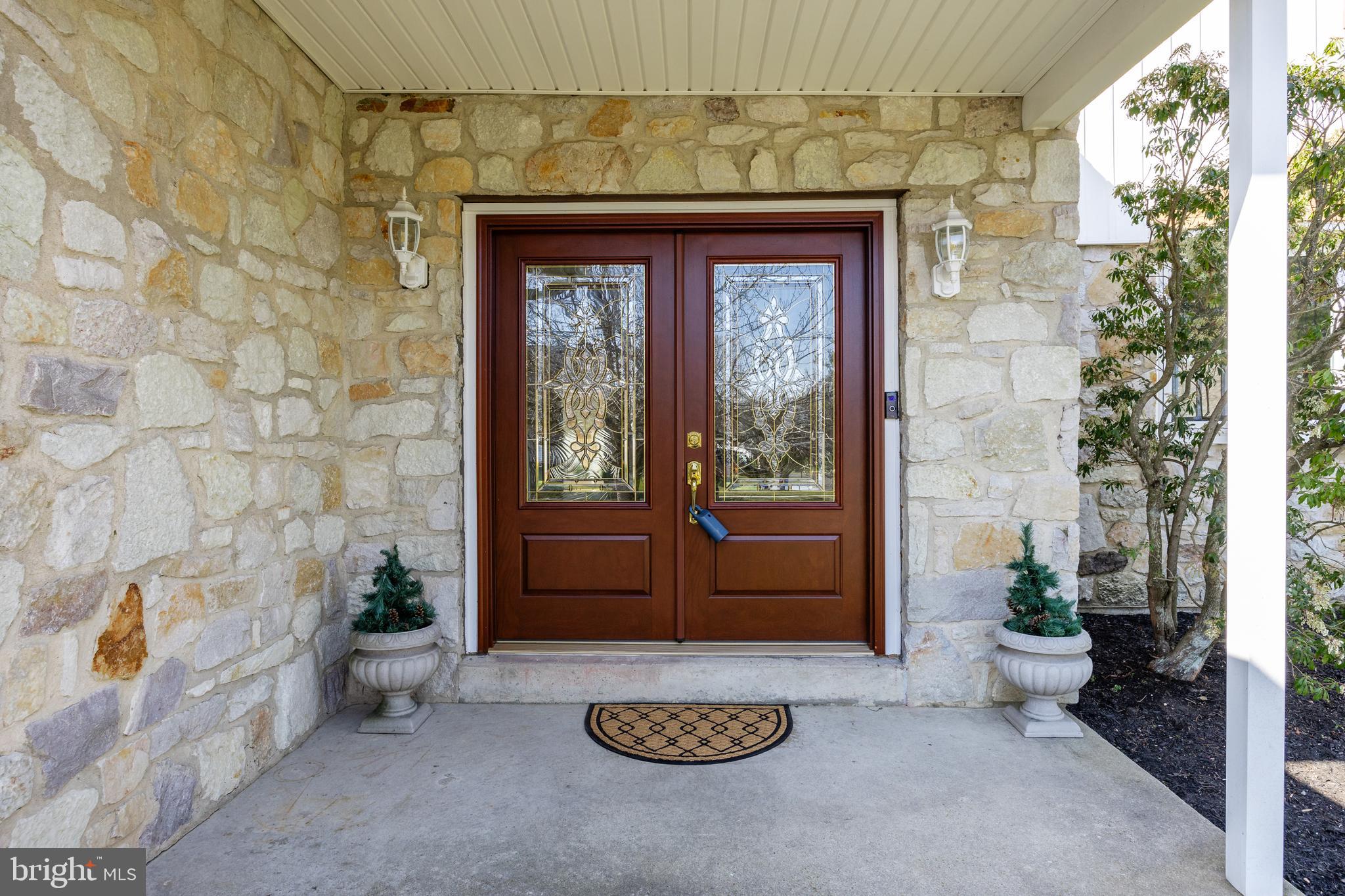 242 Sandringham Road Cherry Hill, NJ 08003 - Photo 3 of 36 a view of a door and chair in the room