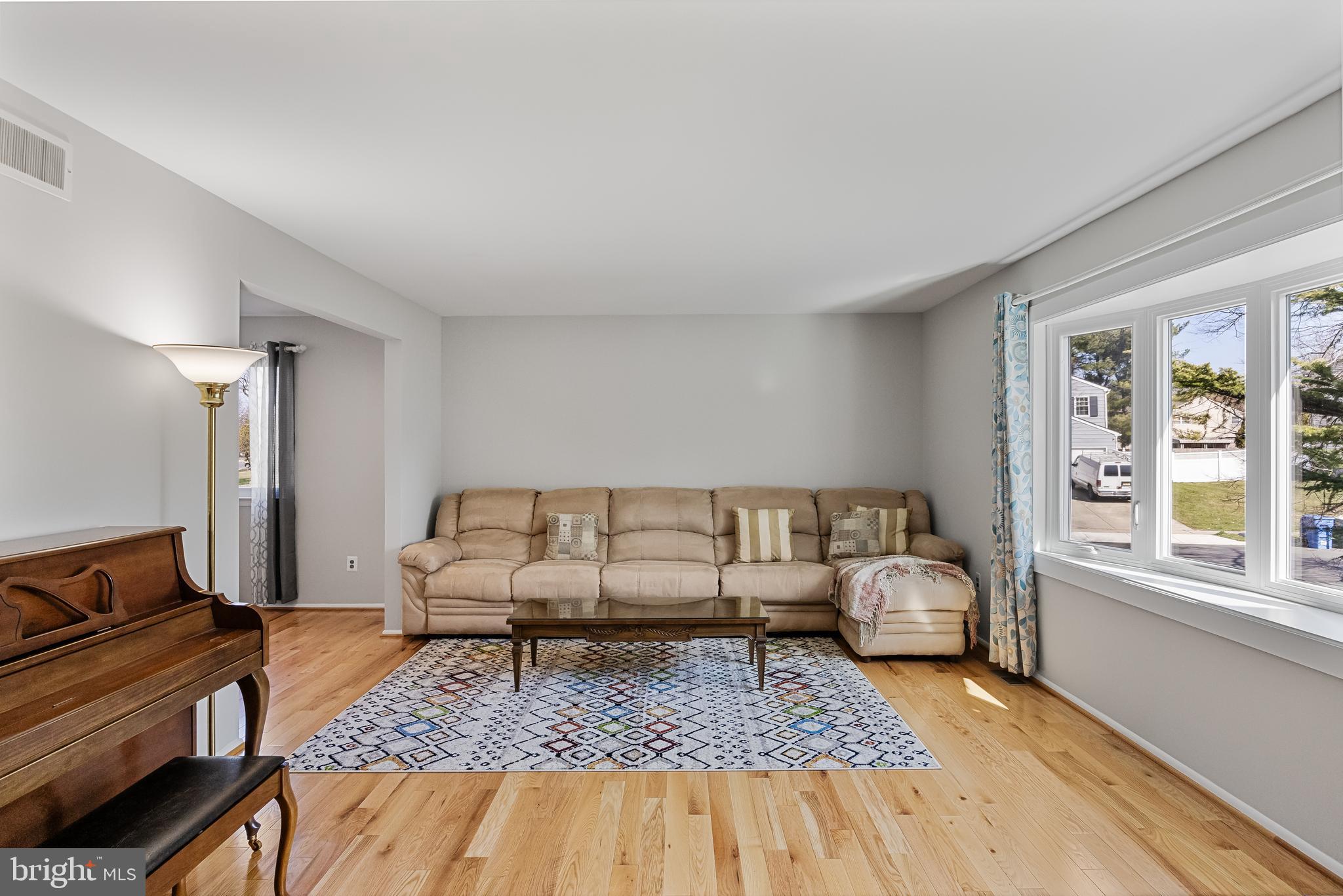242 Sandringham Road Cherry Hill, NJ 08003 - Photo 6 of 36 a living room with furniture and a rug