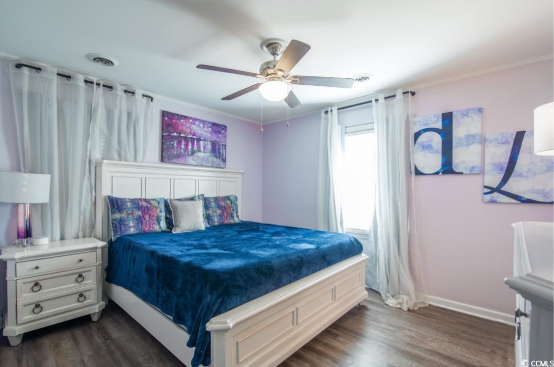 467 Harrelson Road Georgetown, SC 29440 - Photo 15 of 40 Bedroom featuring ceiling fan, crown molding, and