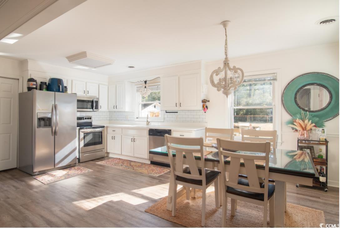 467 Harrelson Road Georgetown, SC 29440 - Photo 8 of 40 Kitchen featuring pendant lighting, decorative bac