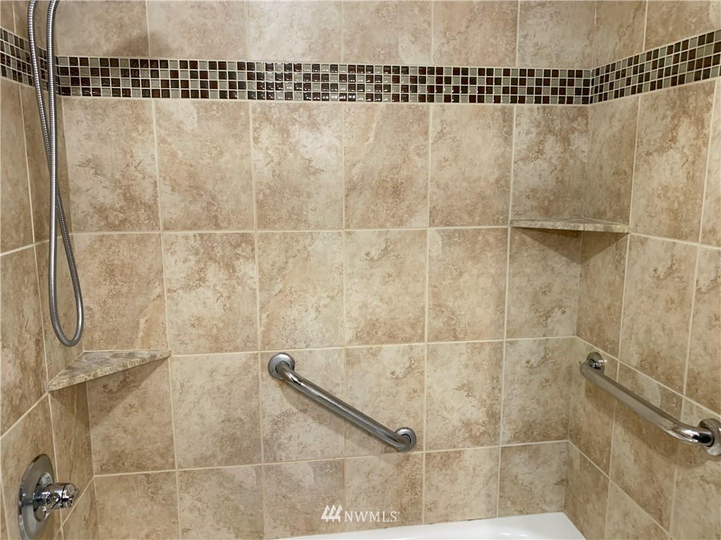 22406 31st Avenue Southeast Bothell, WA 98021 - Photo 22 of 32 a bathroom with a shower