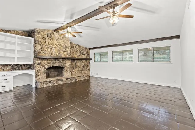 a view of a livingroom with a furniture wooden floor and a chandelier