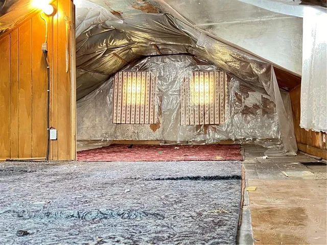 a view of a backyard of the house