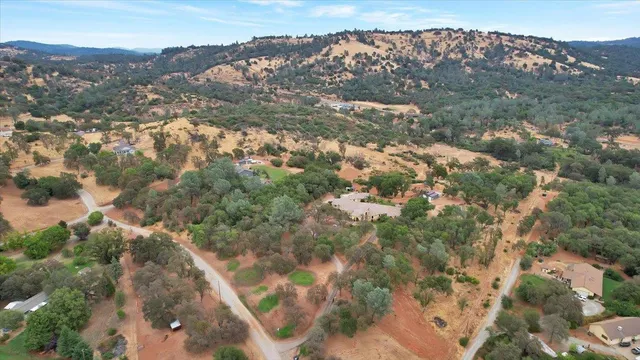 a view of a big yard next to a house