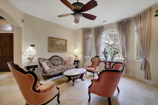 a living room with furniture and a window