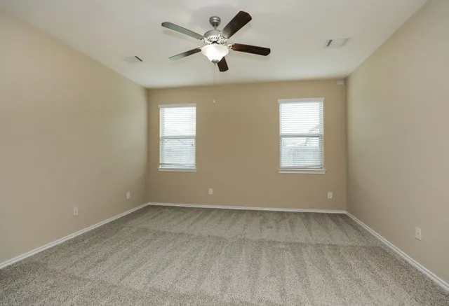 a bathroom with a double vanity sink mirror and double