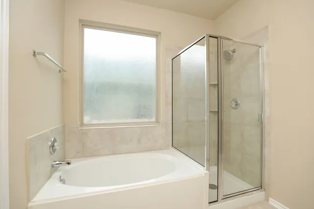 a bathroom with a double vanity sink mirror and