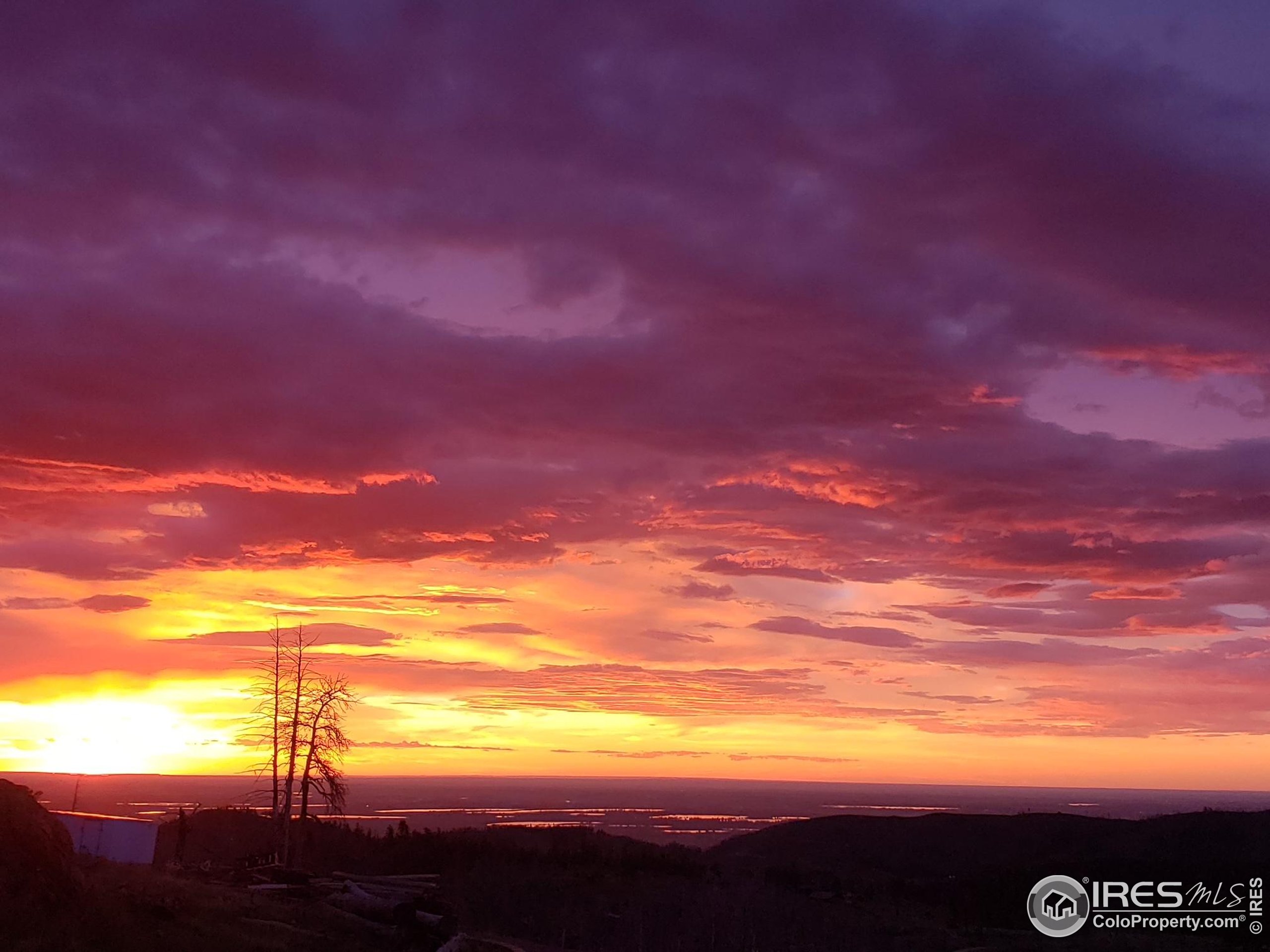 4119 Davis Ranch Road Bellvue, CO 80512 - Photo 30 of 40 a view of sunset
