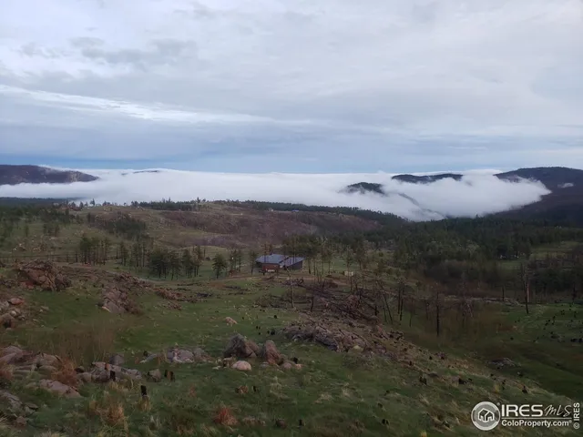 a view of lake with mountain