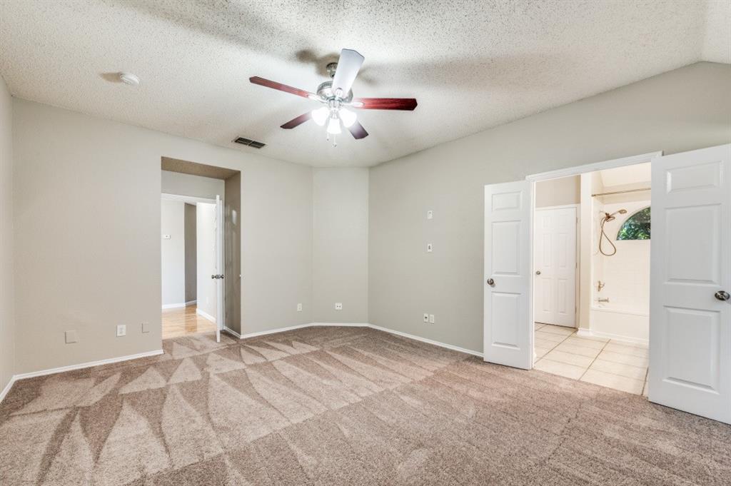 4933 Glenscape Trail Fort Worth, TX 76137 - Photo 9 of 12 a view of an empty room