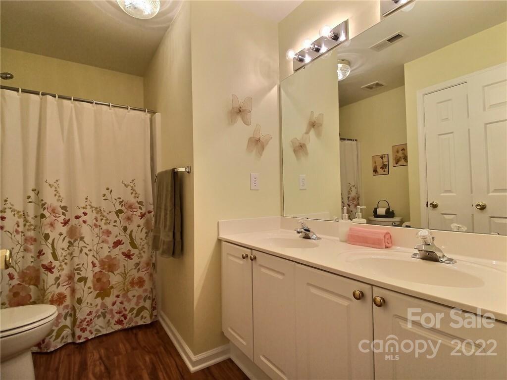 870 Knightsbridge Road Fort Mill, SC 29708 - Photo 19 of 25 a bathroom with a sink and a mirror