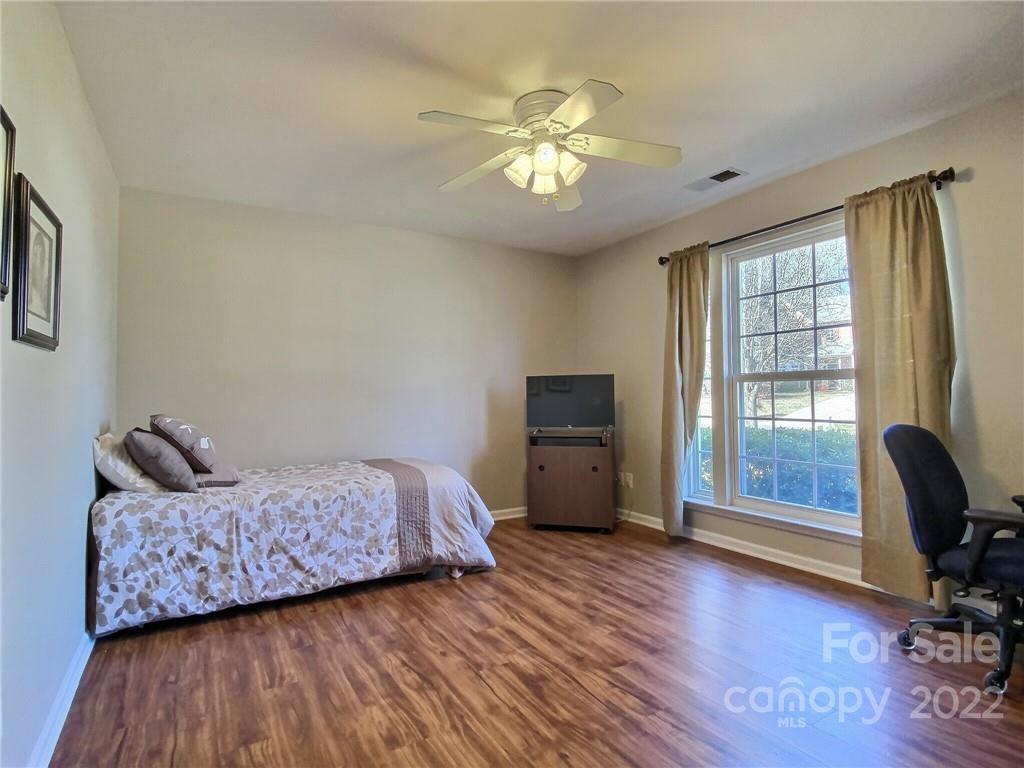 870 Knightsbridge Road Fort Mill, SC 29708 - Photo 21 of 25 a bedroom with furniture and a window