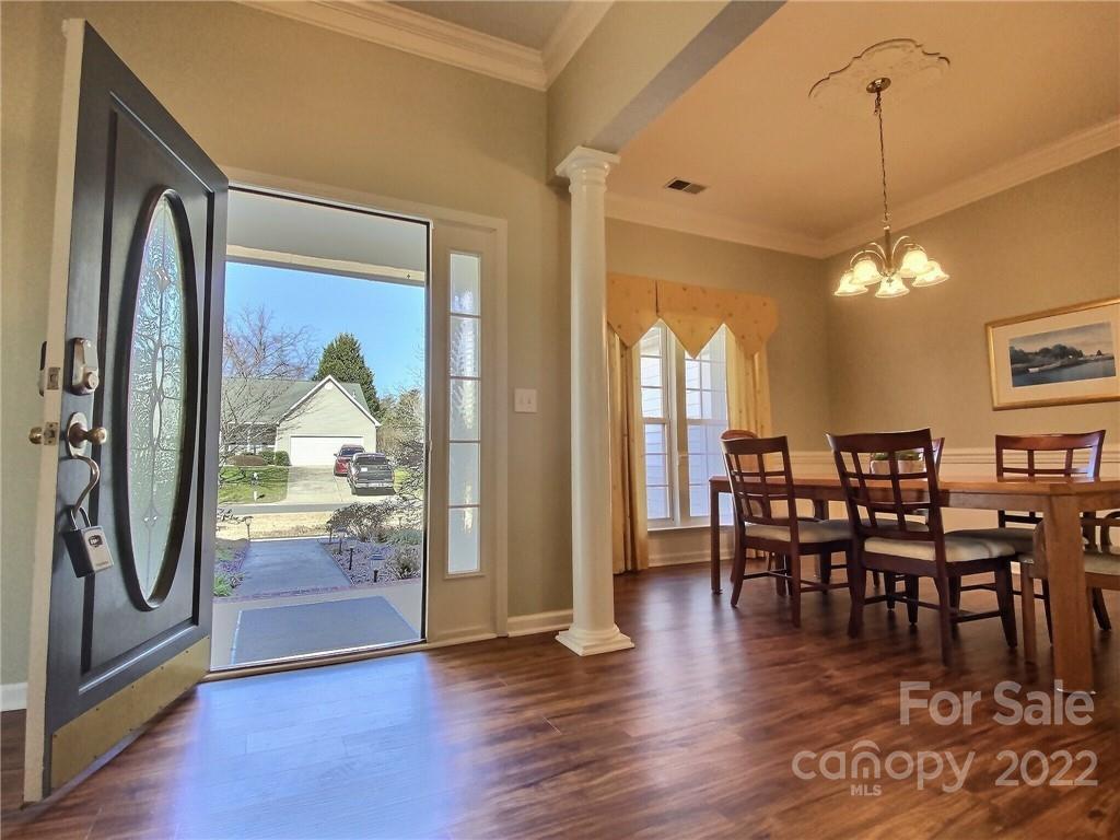 870 Knightsbridge Road Fort Mill, SC 29708 - Photo 3 of 25 a view of a dining room with furniture window and wooden floor