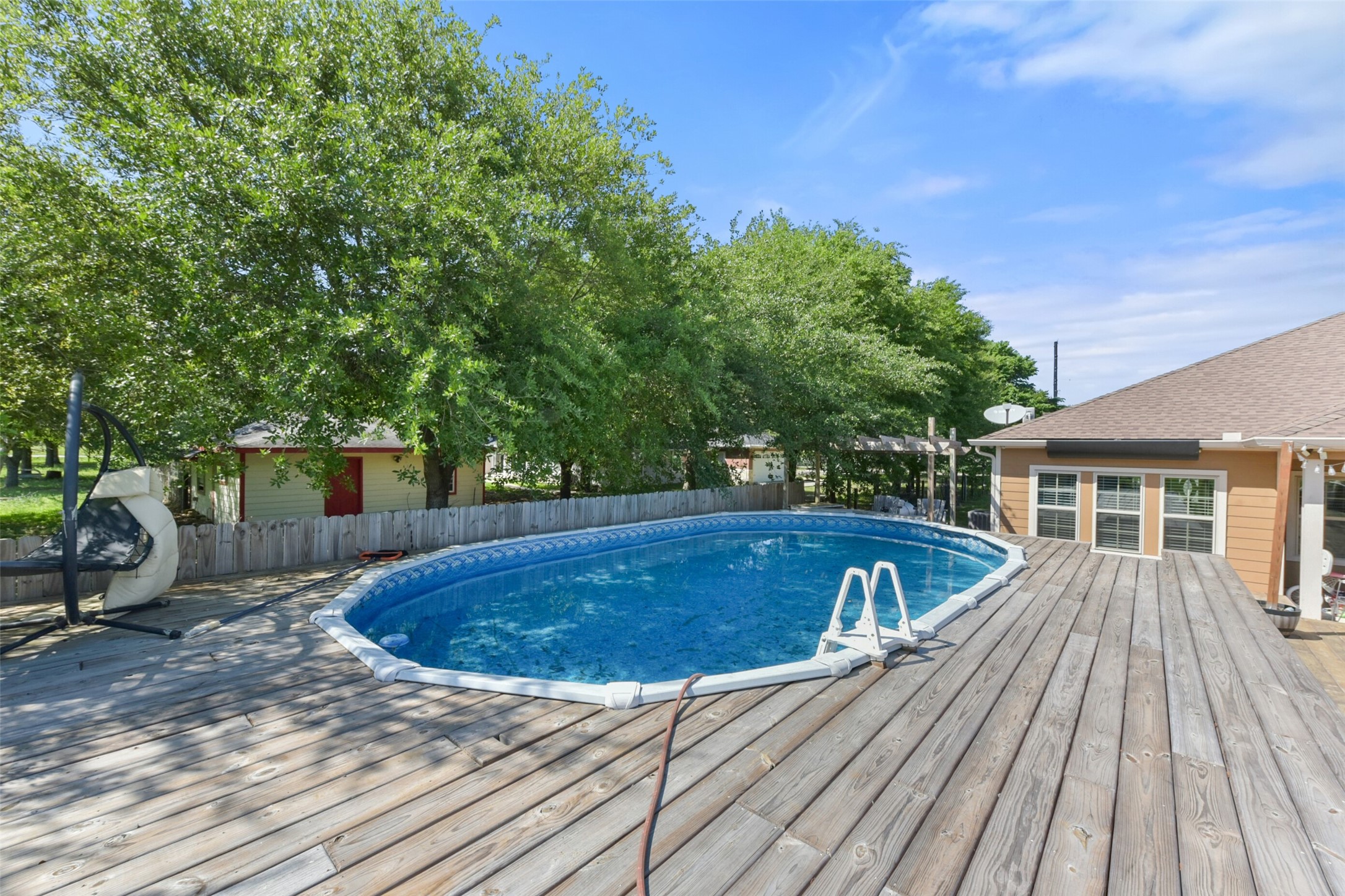 30805 Coco Street Cypress, TX 77433 - Photo 37 of 38 a view of house with swimming pool and sitting area