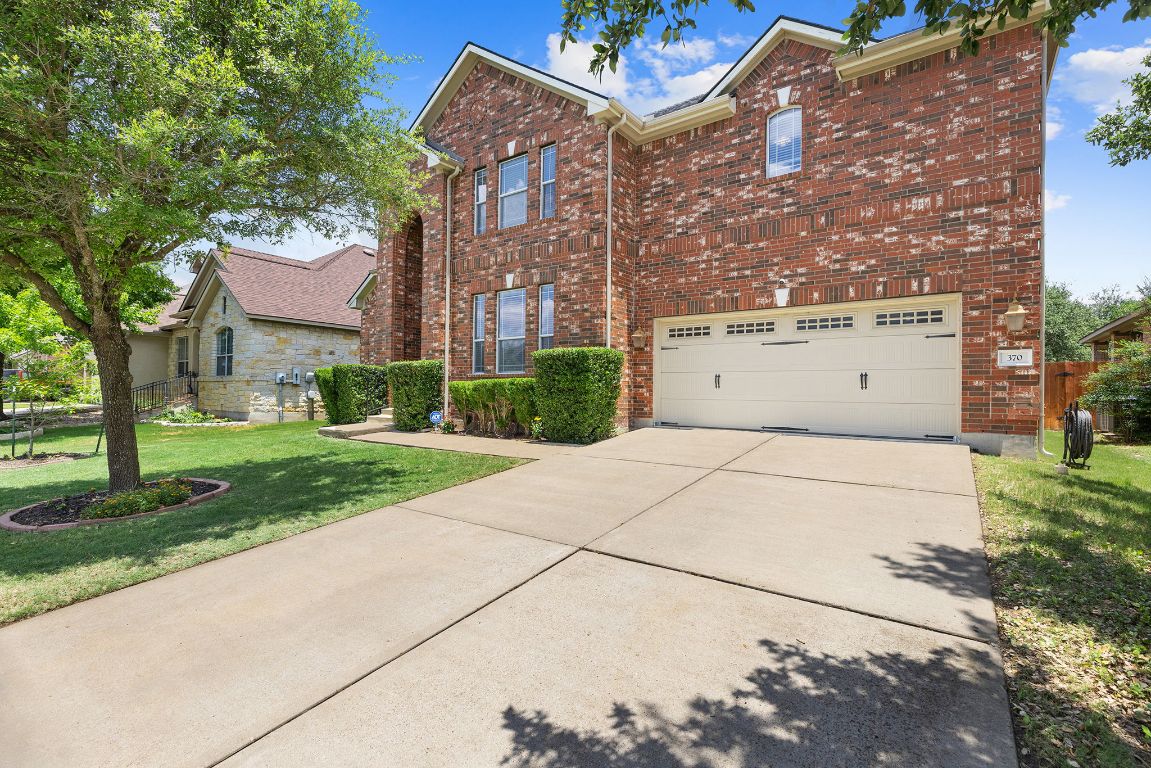 a view of a building with a yard