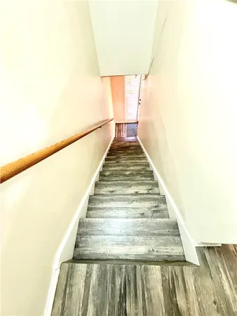a room with furniture and a rug