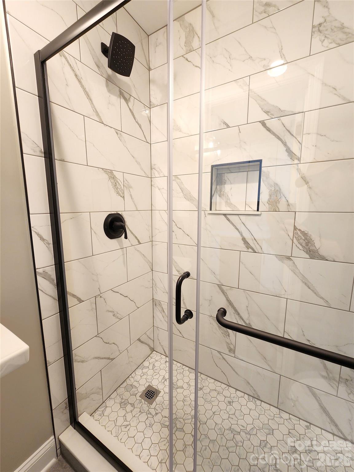 96 1/2 Elm Street Cramerton, NC 28032 - Photo 13 of 20 a bathroom with a shower and a mirror