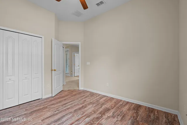 a view of a livingroom with wooden floor